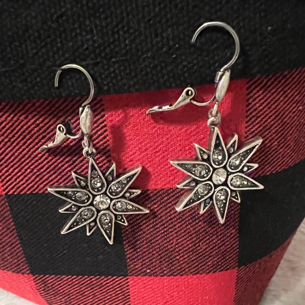 Beautiful antique silver pierced earrings with diamond like stones.